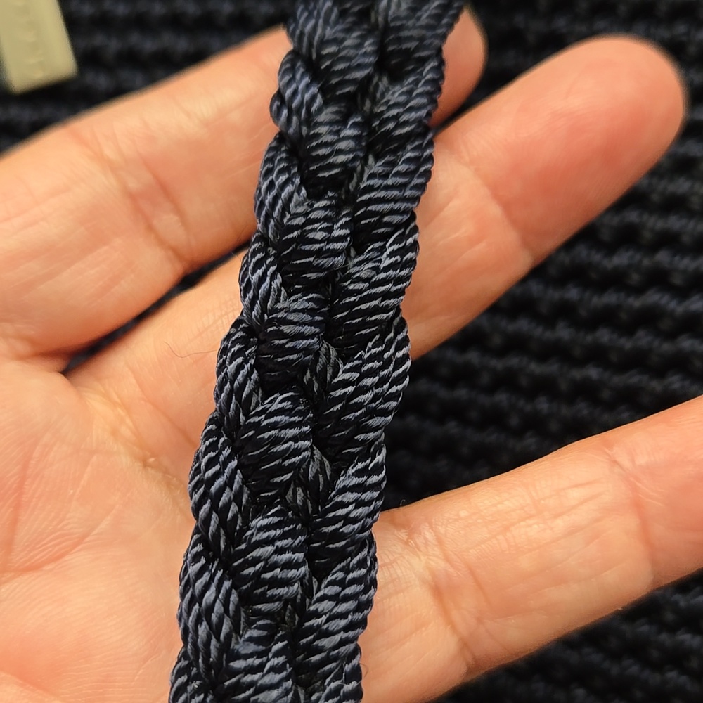 The Sak Navy Blue Crochet Tote Drawsting Backpack with Gold Logo Charm. - Picture 10 of 15